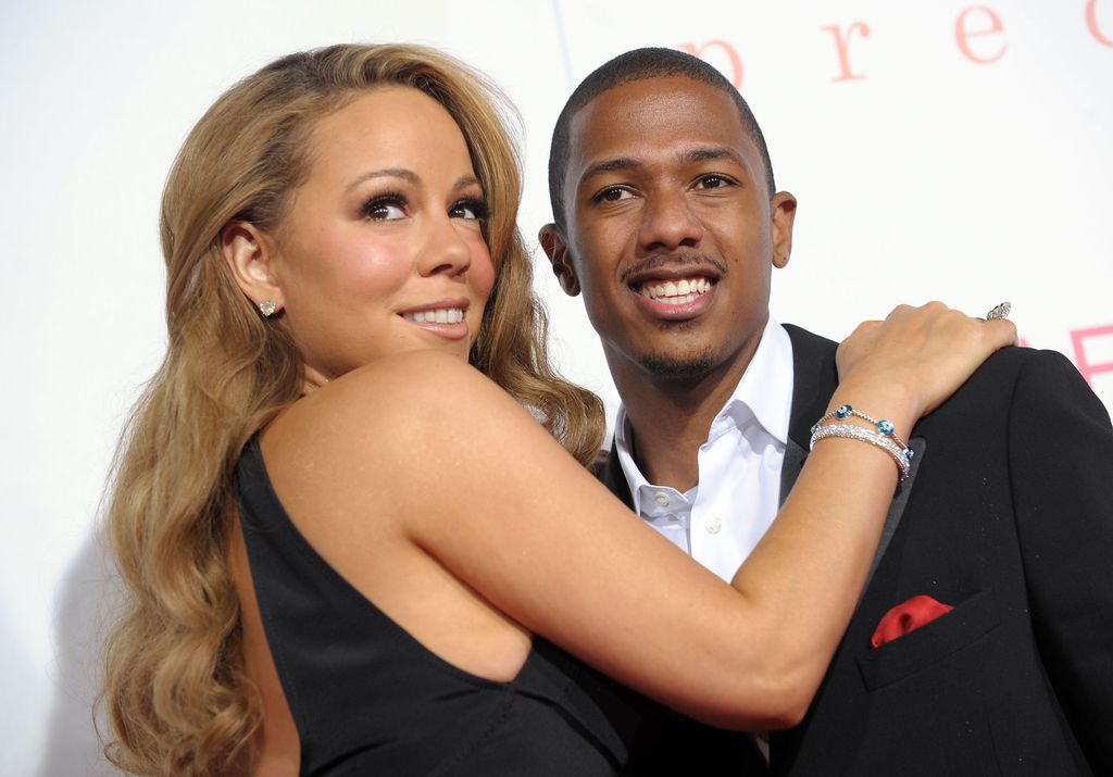 Actress/singer Mariah Carey (L) and actor Nick Cannon arrive at the screening of 