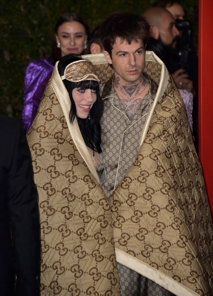 Billie Eilish and Jesse Rutherford in a carpet outfit