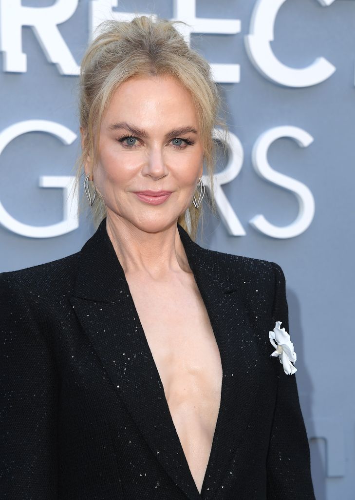 photo of nicole kidman wearing suit jacket with no bra