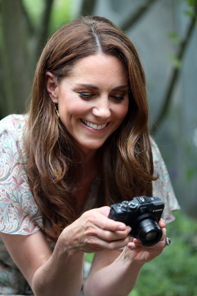 Kate Middleton smiling at a camera