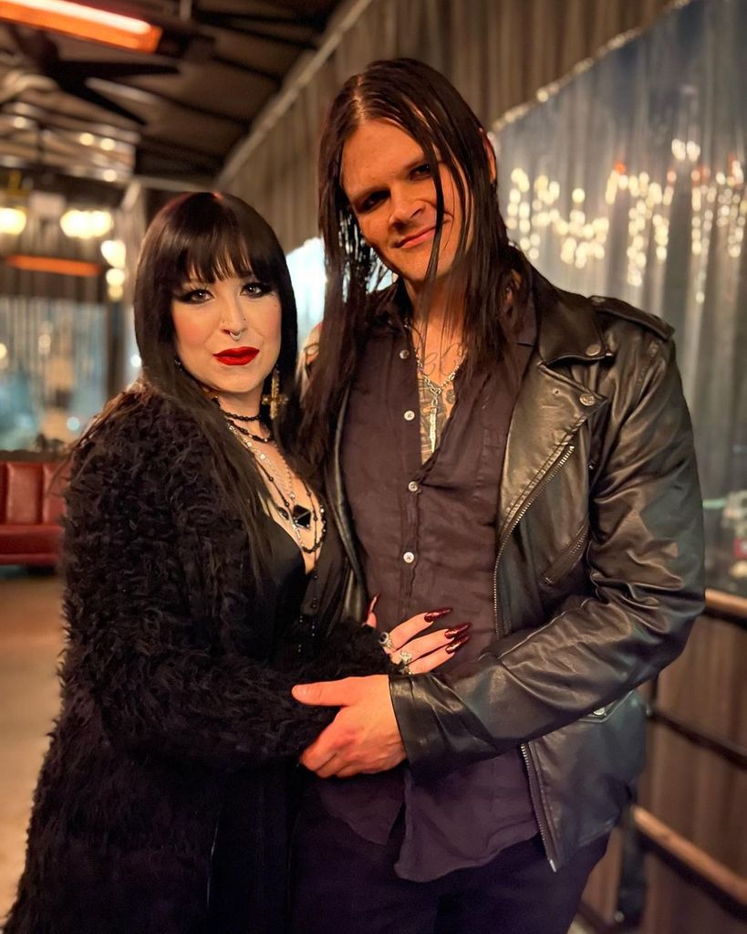 Travis Bacon posing alongside girlfriend Angelina Sambrotto