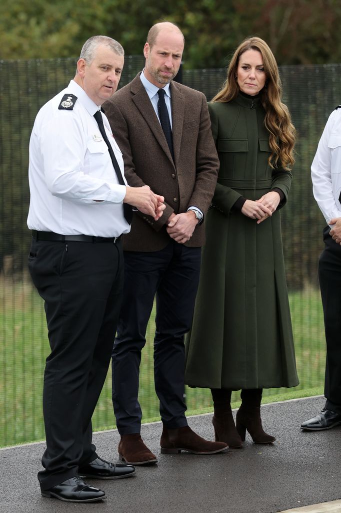Kate Middleton and Prince William with police officer