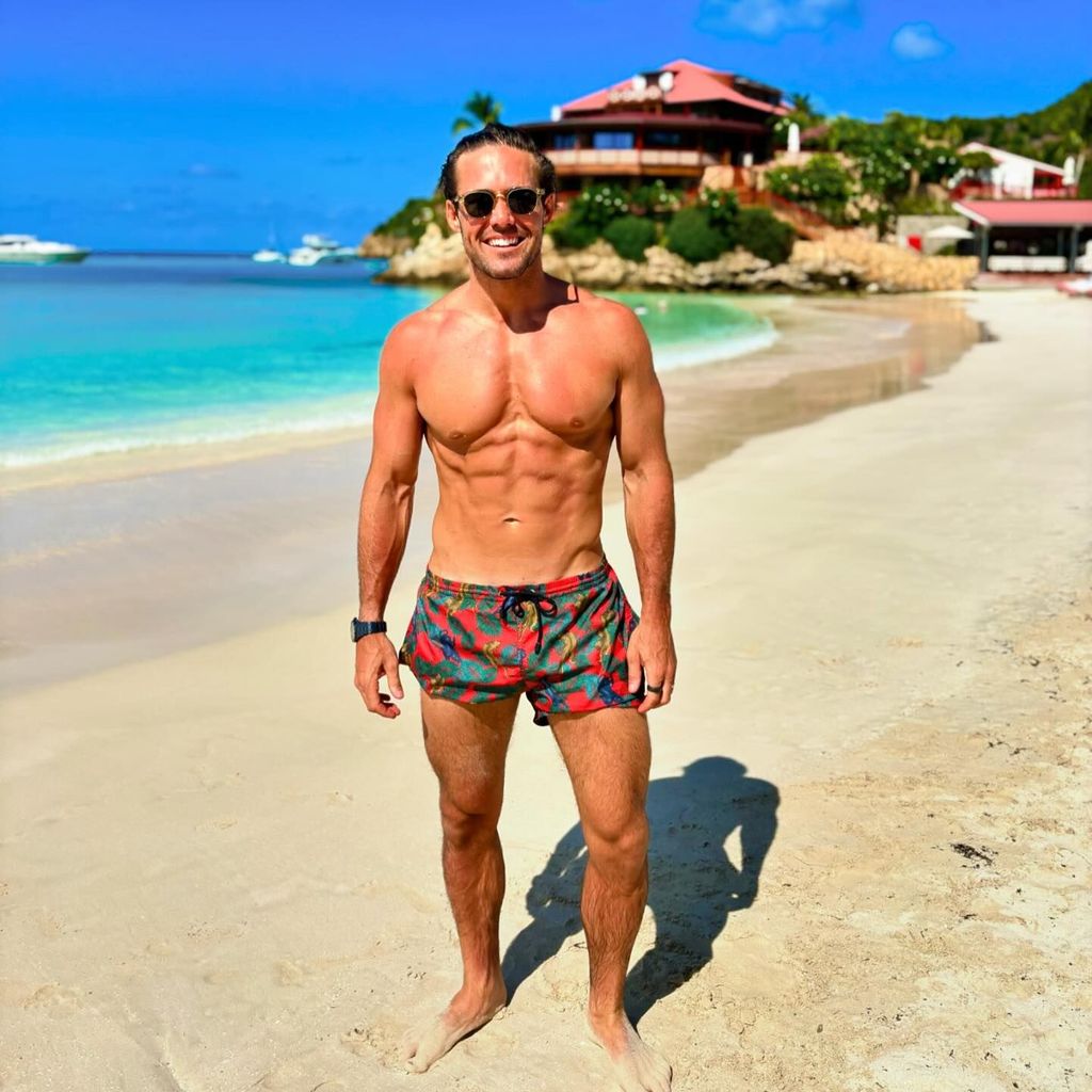 Spencer Matthews shirtless and tanned on beach in St Barts displaying six pack abs 