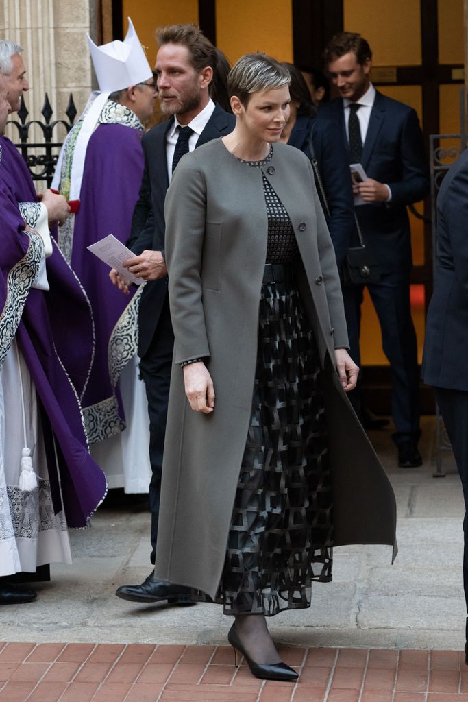 Princess Charlene of Monaco and Andrea Casiraghi arrive at the cathedral to attend a mass in memory of Prince Rainer III of Monaco