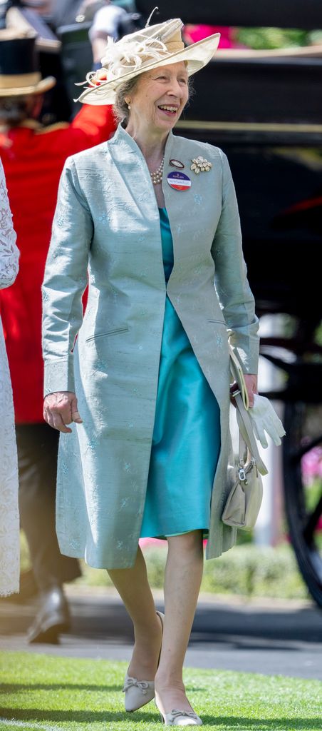 Princess Anne in satin blue dress and coat dress