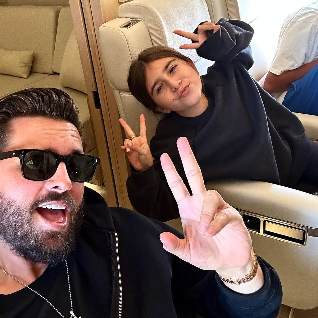 Scott Disick with daughter Penelope on a private plane