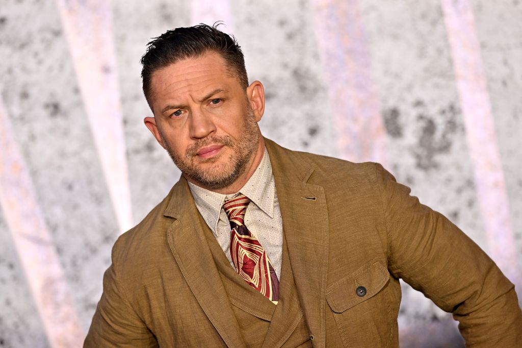 Tom Hardy was spotted in Cannes being the perfect husband