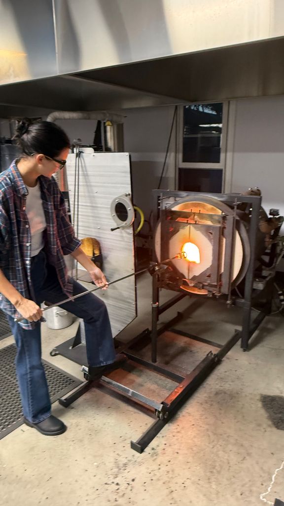 Kendall paired a classic plaid shirt with a white tee and jeans