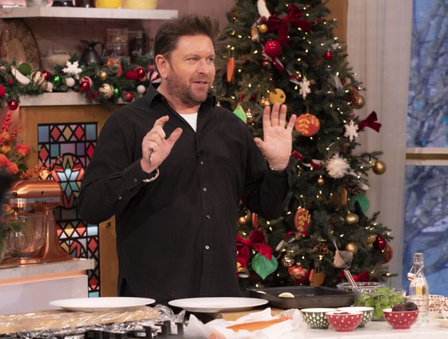 james martin on this morning in front of a christmas tree