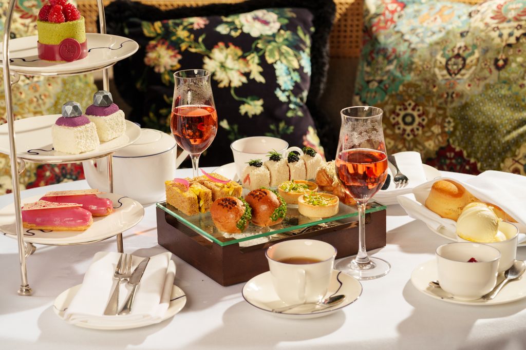 An afternoon tea with sandwiches, desserts and scones
