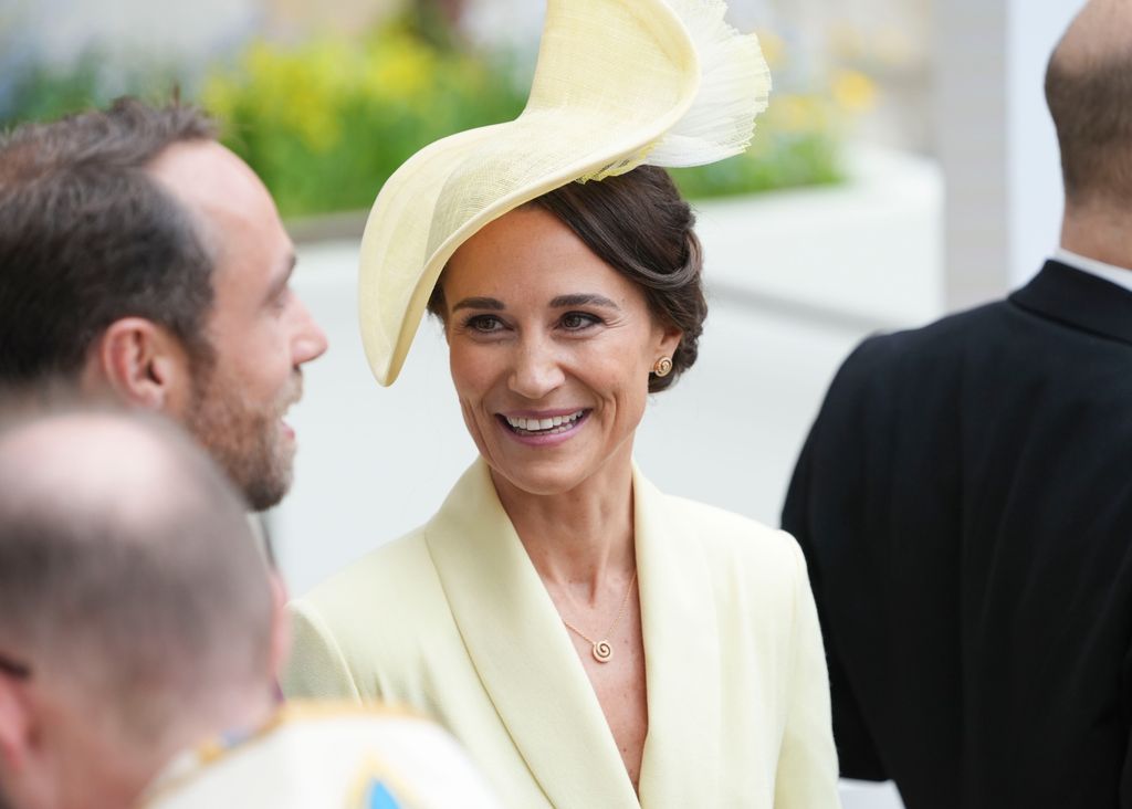 Pippa Middleton smiling in yellow hat