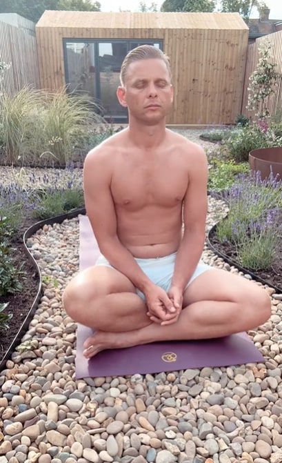 Jeff Brazier meditating in back garden