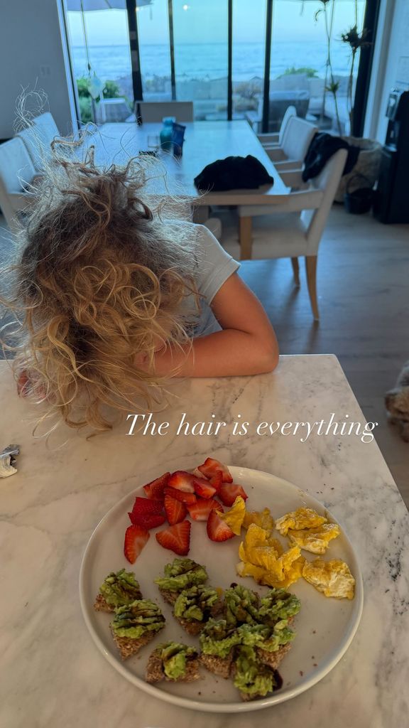 daisy dove head on table wild blonde curls