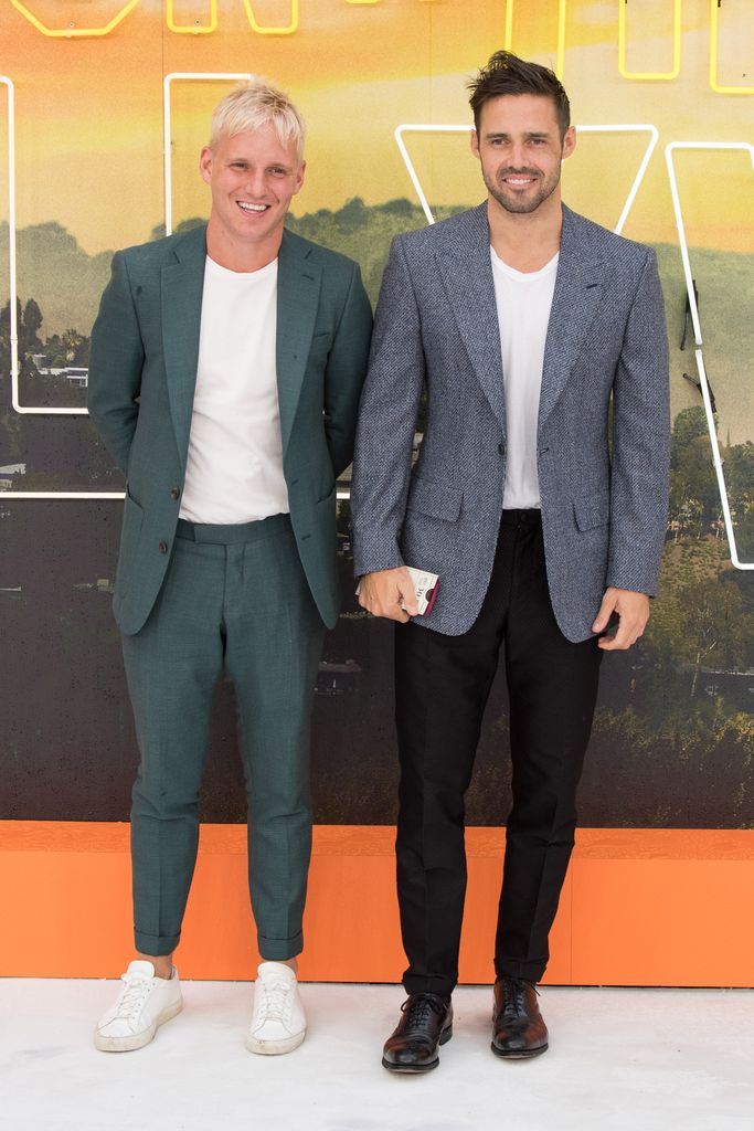 Jamie Laing in a green suit and Spencer Matthews in a grey jacket at the Once Upon a Time... in Hollywood Premiere in 2019