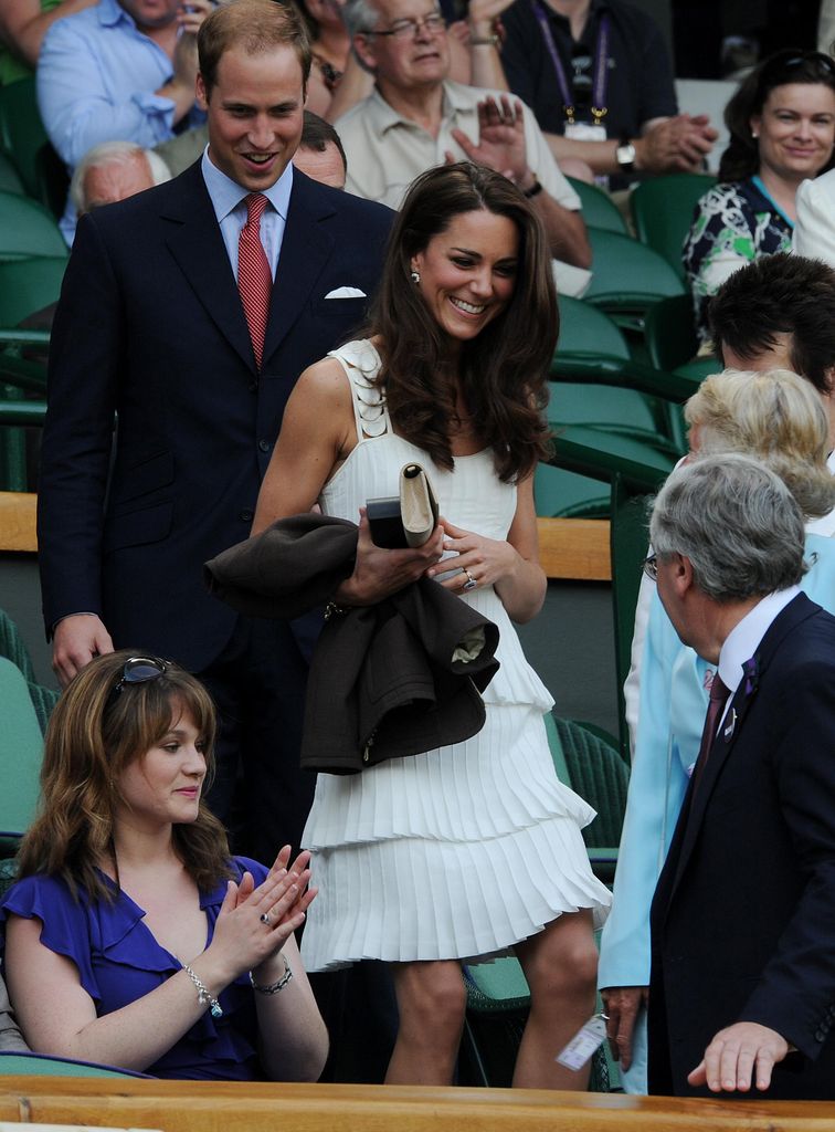 The Duke and Duchess of Cambridge arrive in the Royal Box on Centre Court