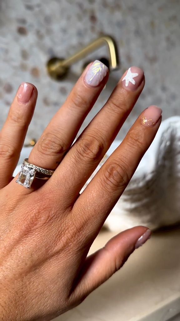 Stacey Solomon showing off her manicure and third engagement ring