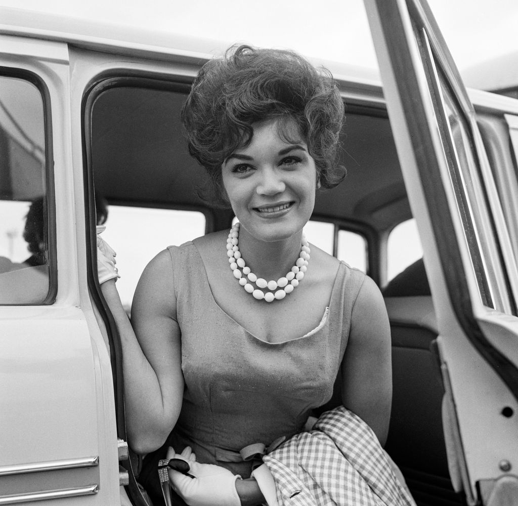Black-and-white photo of Connie Francis in a car
