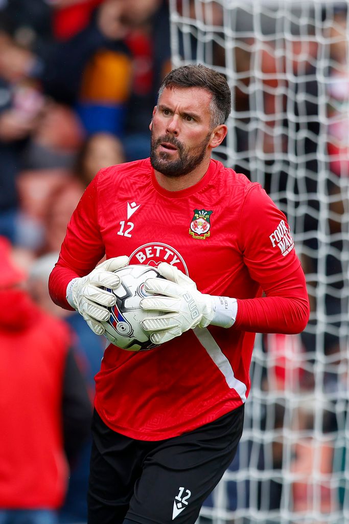Ben Foster of Wrexham warms-up before the Sky Bet League Two match between Wrexham and Milton Keynes Dons at Stok Cae Ras stadium on August 05, 2023 in Wrexham, Wales
