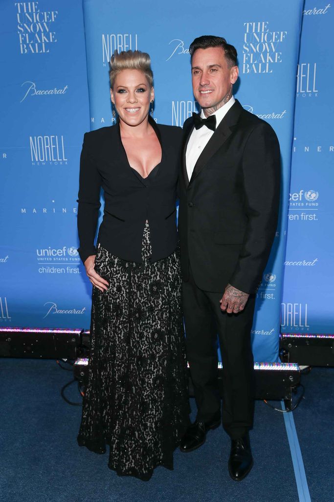 Pink in a black dress with her husband Carey Hart 