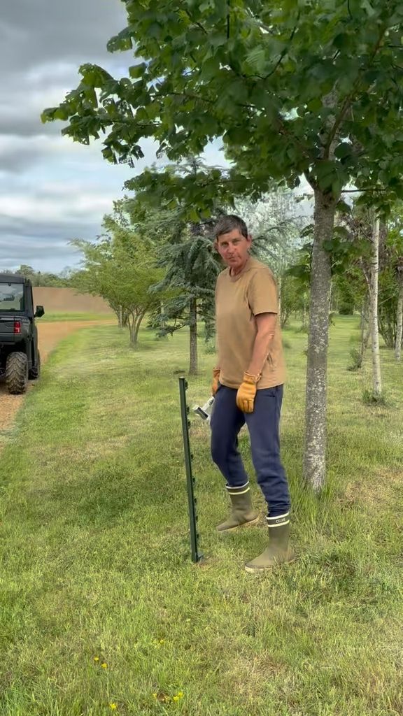 Ellen DeGeneres captured tending to the lawn of her Cotswolds home, shared on Instagram