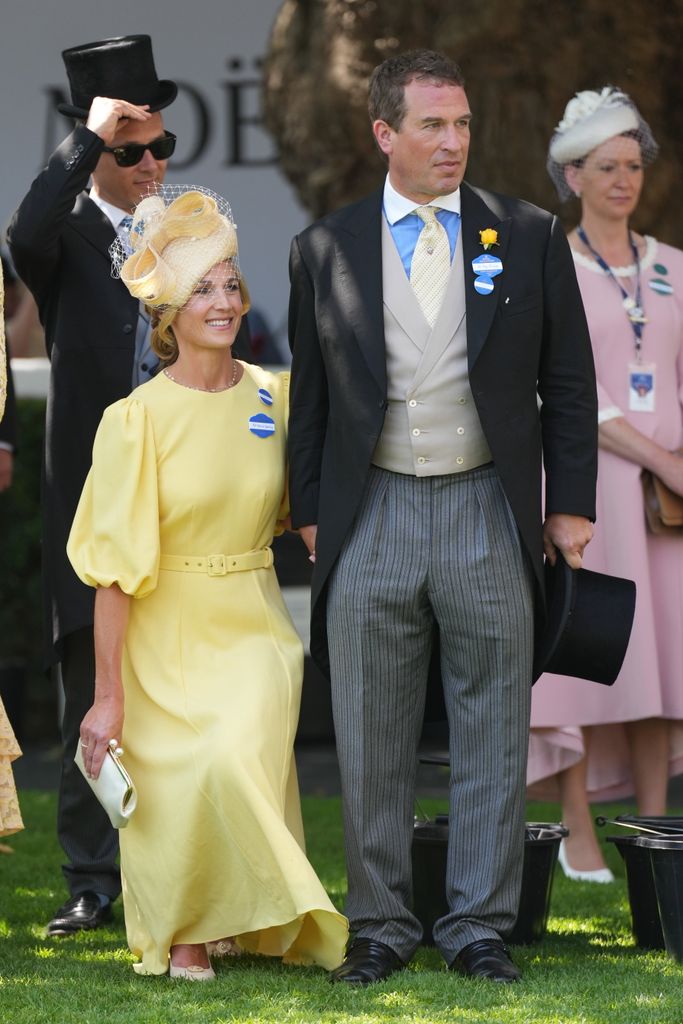 Harriet Sperling curtseying in lemon dress