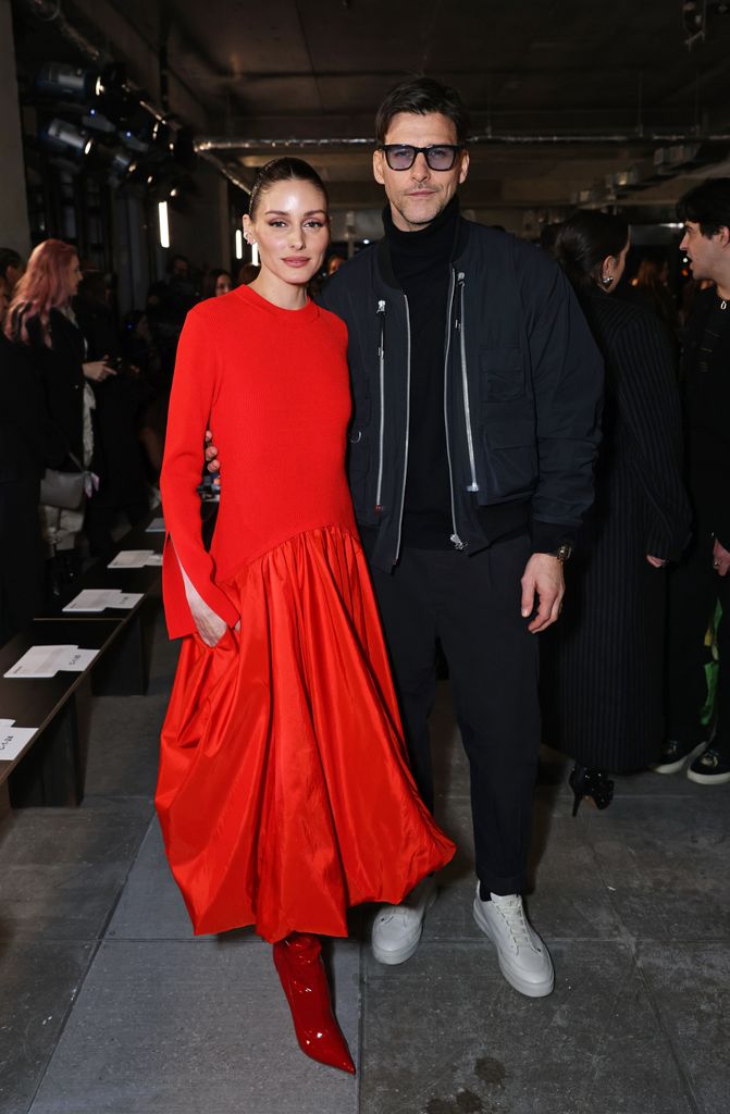 Olivia Palermo in red dress and Johannes Huebl in all black 