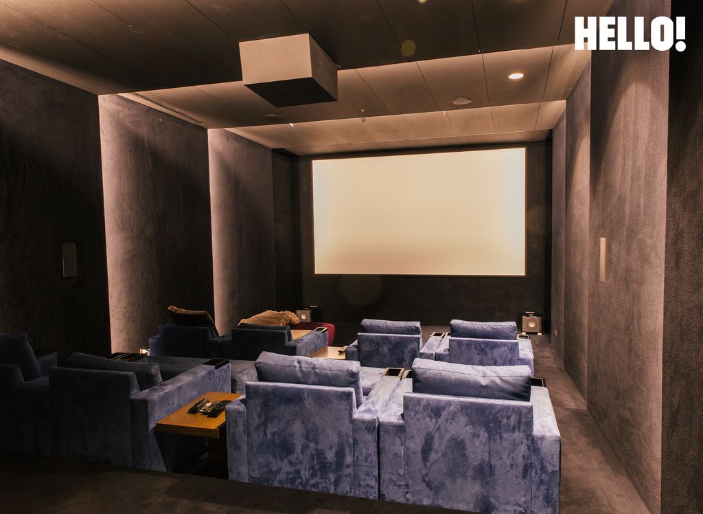 The cinema room inside their three-storey, contemporary-style house