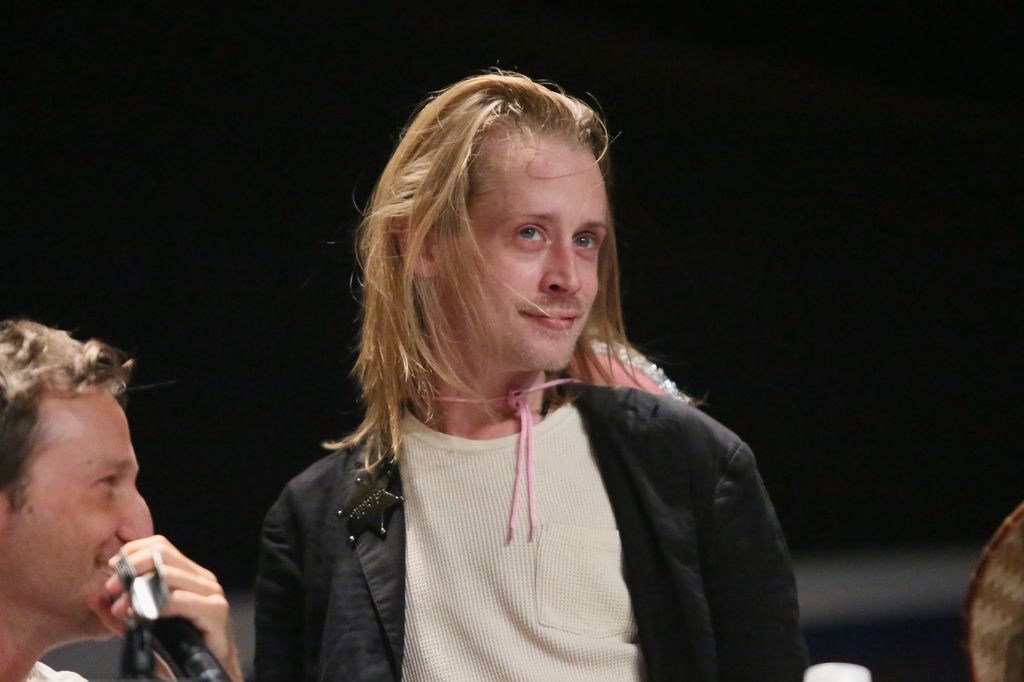 Macaulay Culkin with long blonde hair