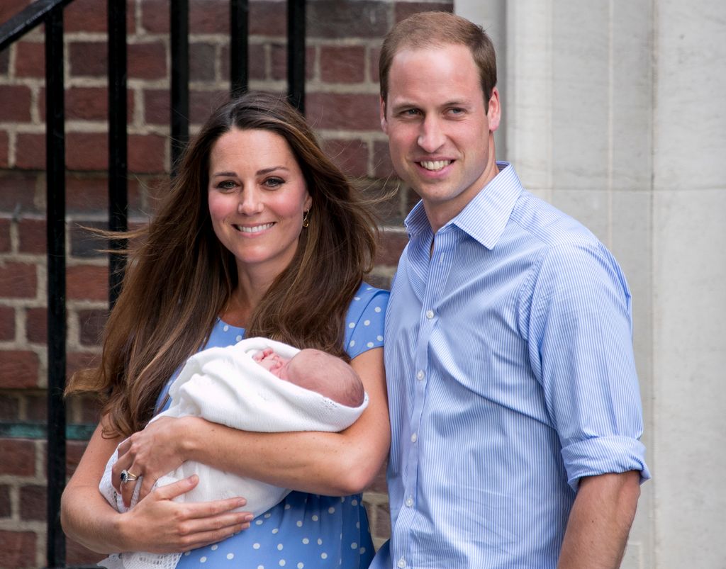 Prince William, Duke of Cambridge and Catherine, Duchess of Cambridge with their newborn son Prince George
