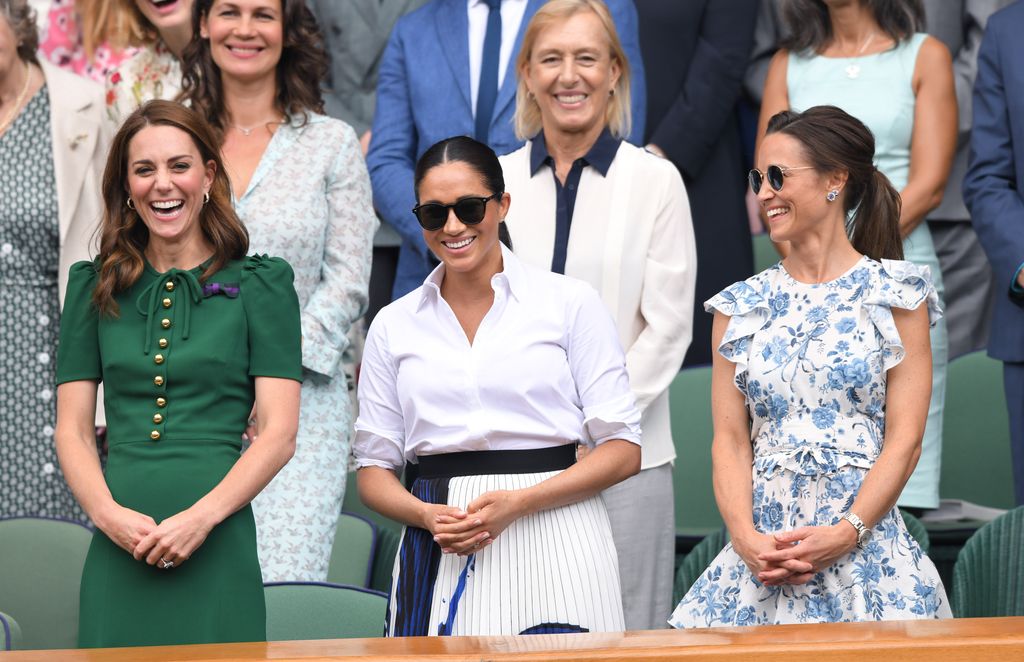 Kate Middleton with Meghan, Duchess of Sussex and Pippa Middleton in the Royal Box on Centre Court during day twelve of the Wimbledon Tennis Championships