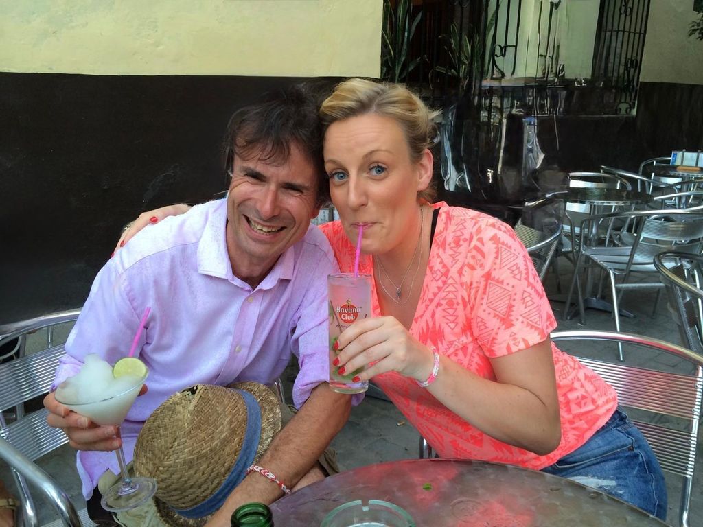 steph and robert peston on holiday sipping cocktails