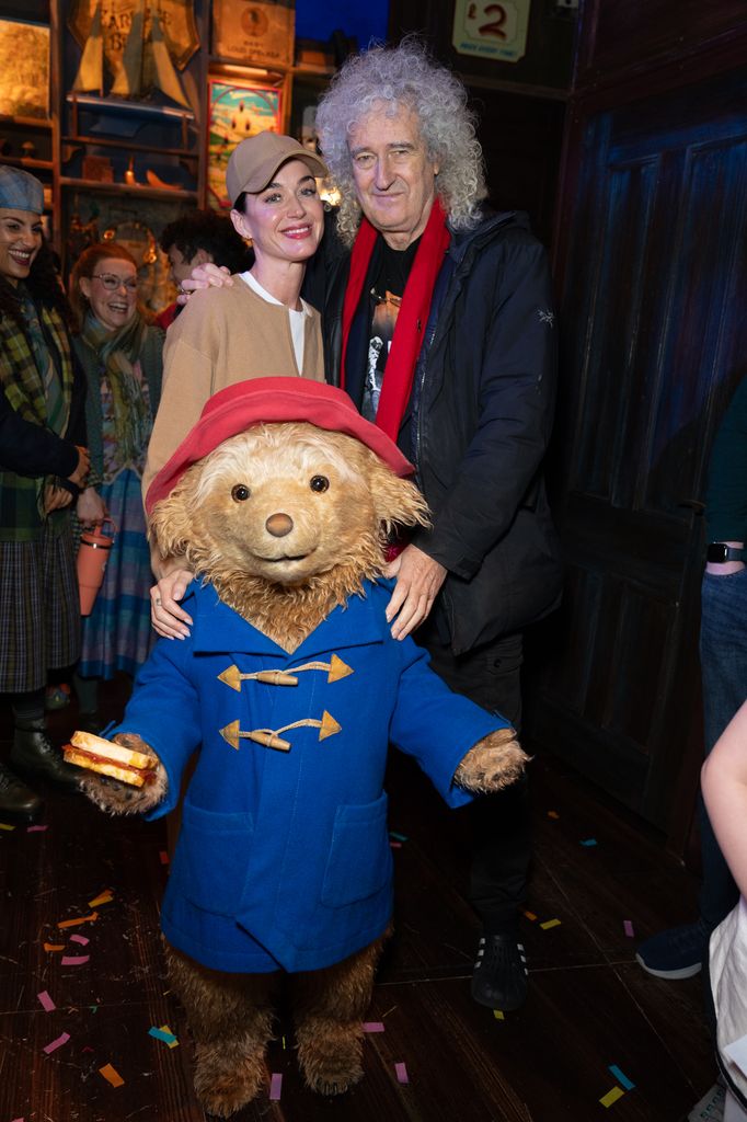 Katy Perry posing with Brian May and Paddington Bear