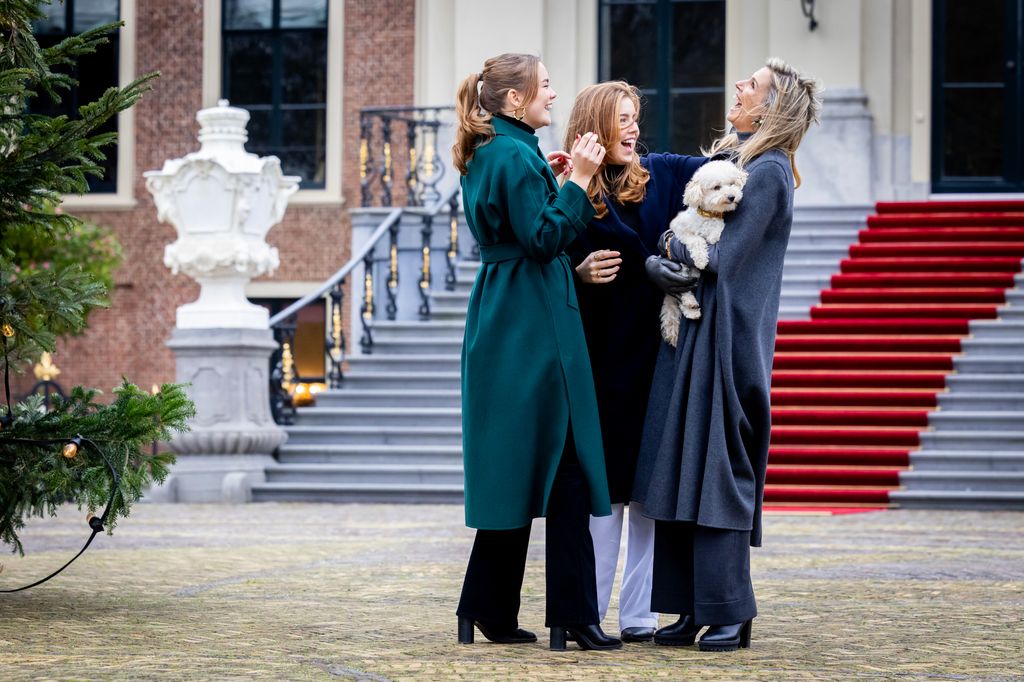 Maxima laughing with daughters