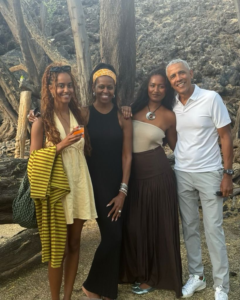 Malia, Michele, Sasha and Barack Obama pose for a family photo on vacation, shared on Instagram