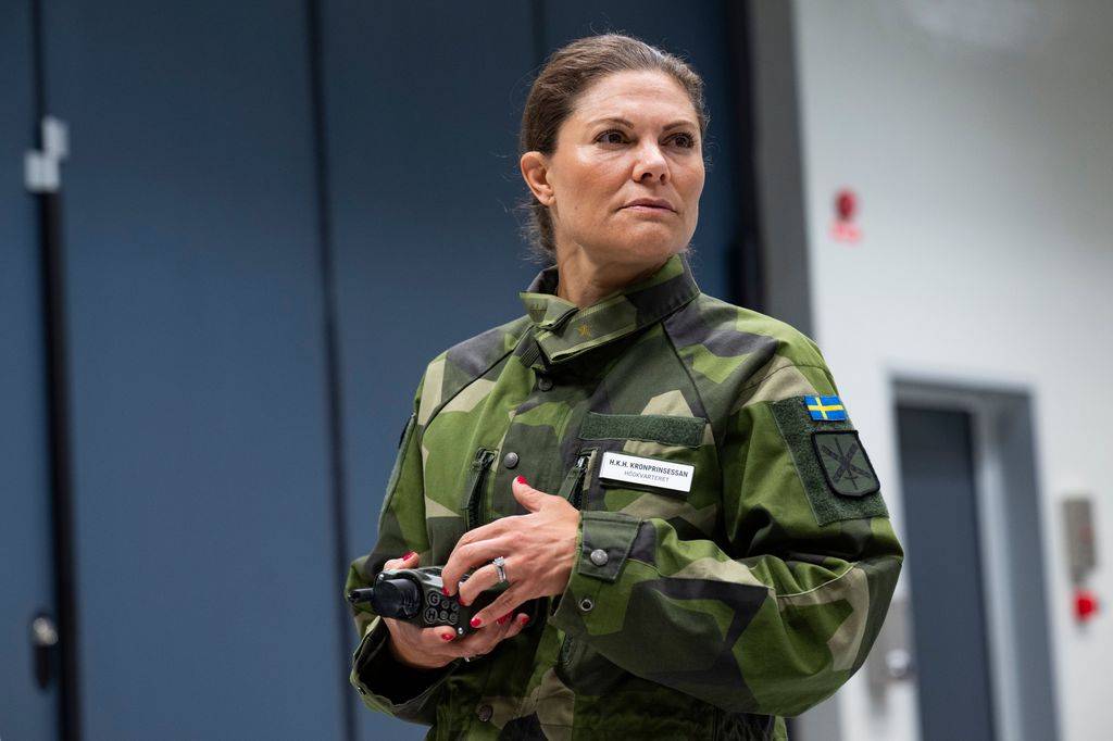 Crown Princess Victoria in a camoflague outfit