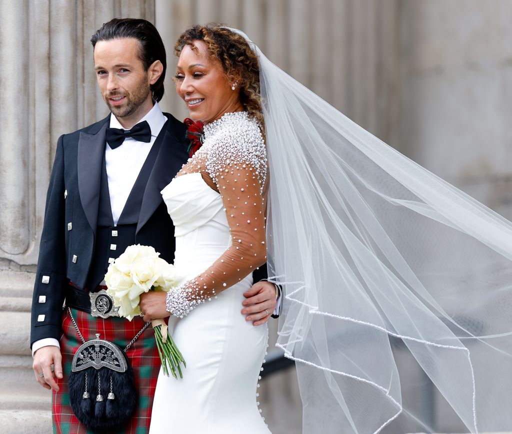 Rory McPhee and Mel B in suit and kilt and bridal gown