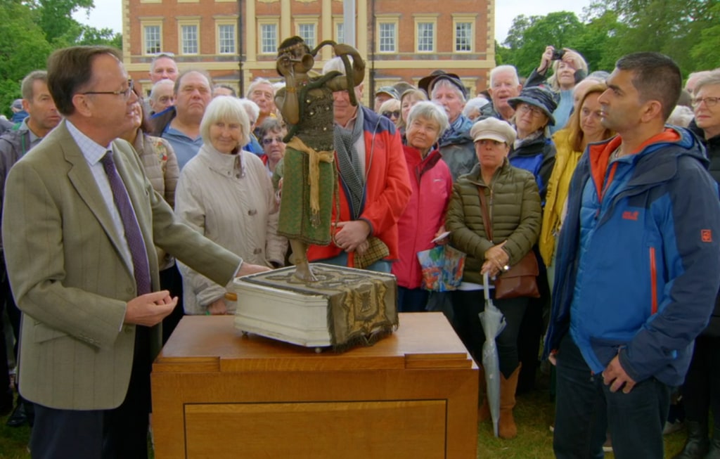 Antiques Roadshow's Jon Baddeley and automaton