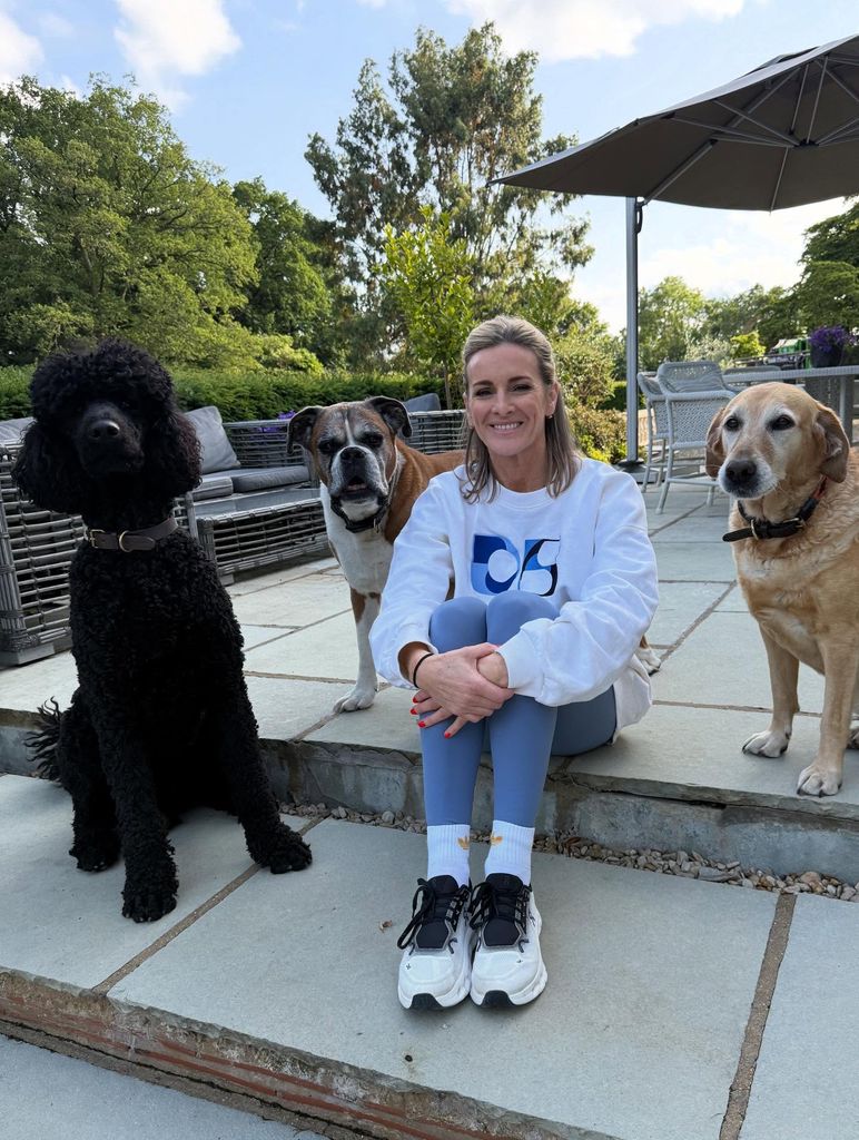 Gabby Logan and three dogs 