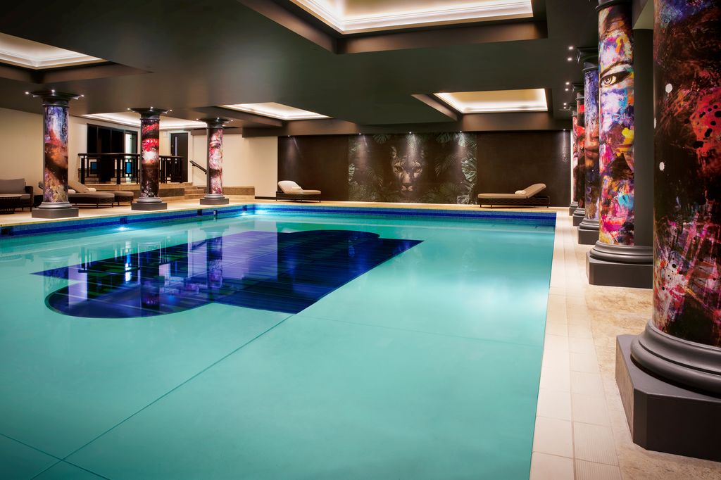 NYX Hotel Holborn pool with wild animal design and column pillars