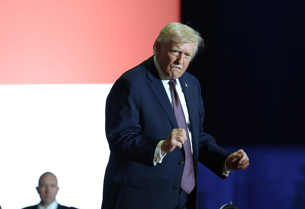 U.S. President Donald Trump dances on stage during a rally at the Rocky Mount Event Center on December 19, 2025 