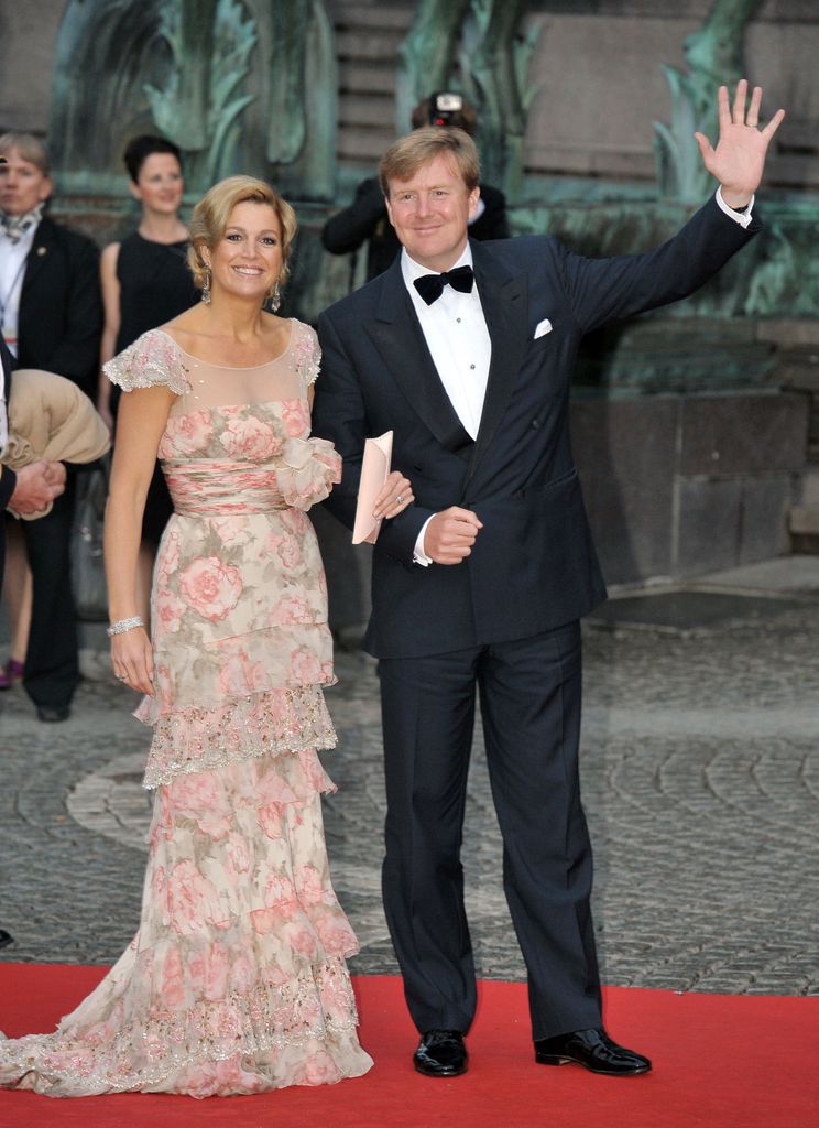 Queen Maxima in a floral printed gown with her husband Crown Prince Willem-Alexander