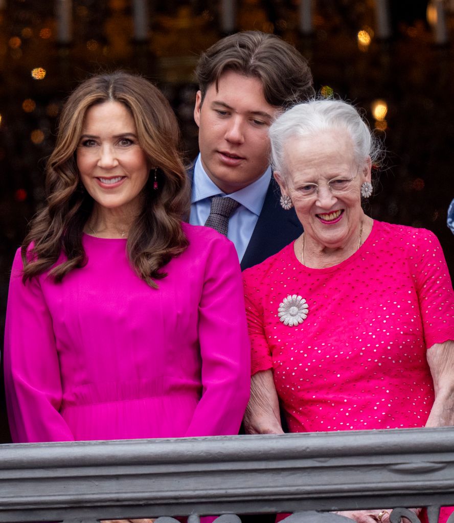Queen Mary of Denmark and Crown Prince Christian of Denmark with Queen Margrethe II of Denmark twinned in pink