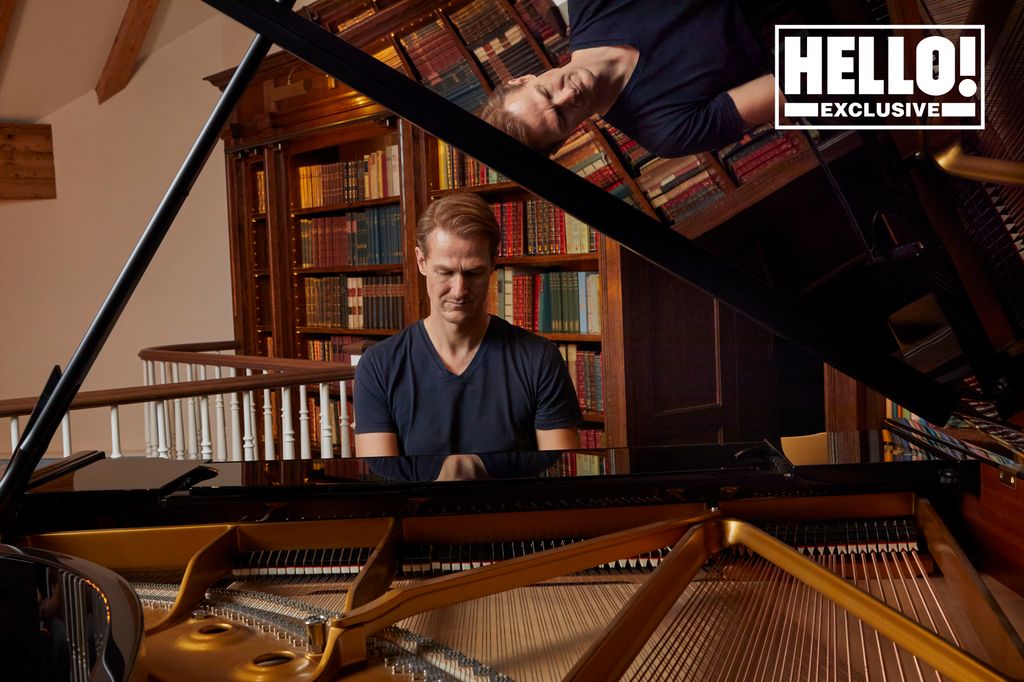 Jan playing the piano in his Swiss countryside retreat