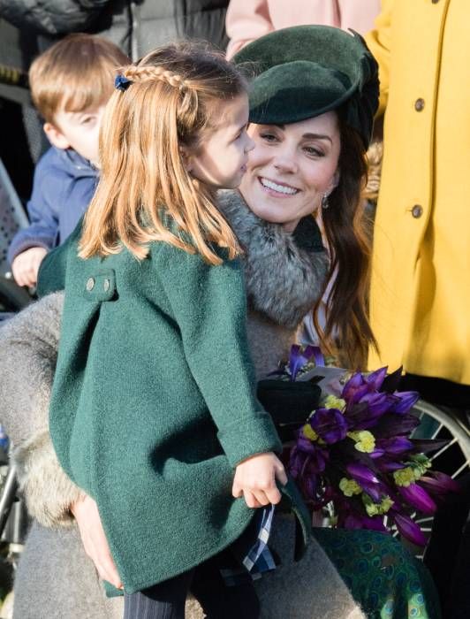 Kate Middleton wears a green hat and furry coat on Christmas Day 2019