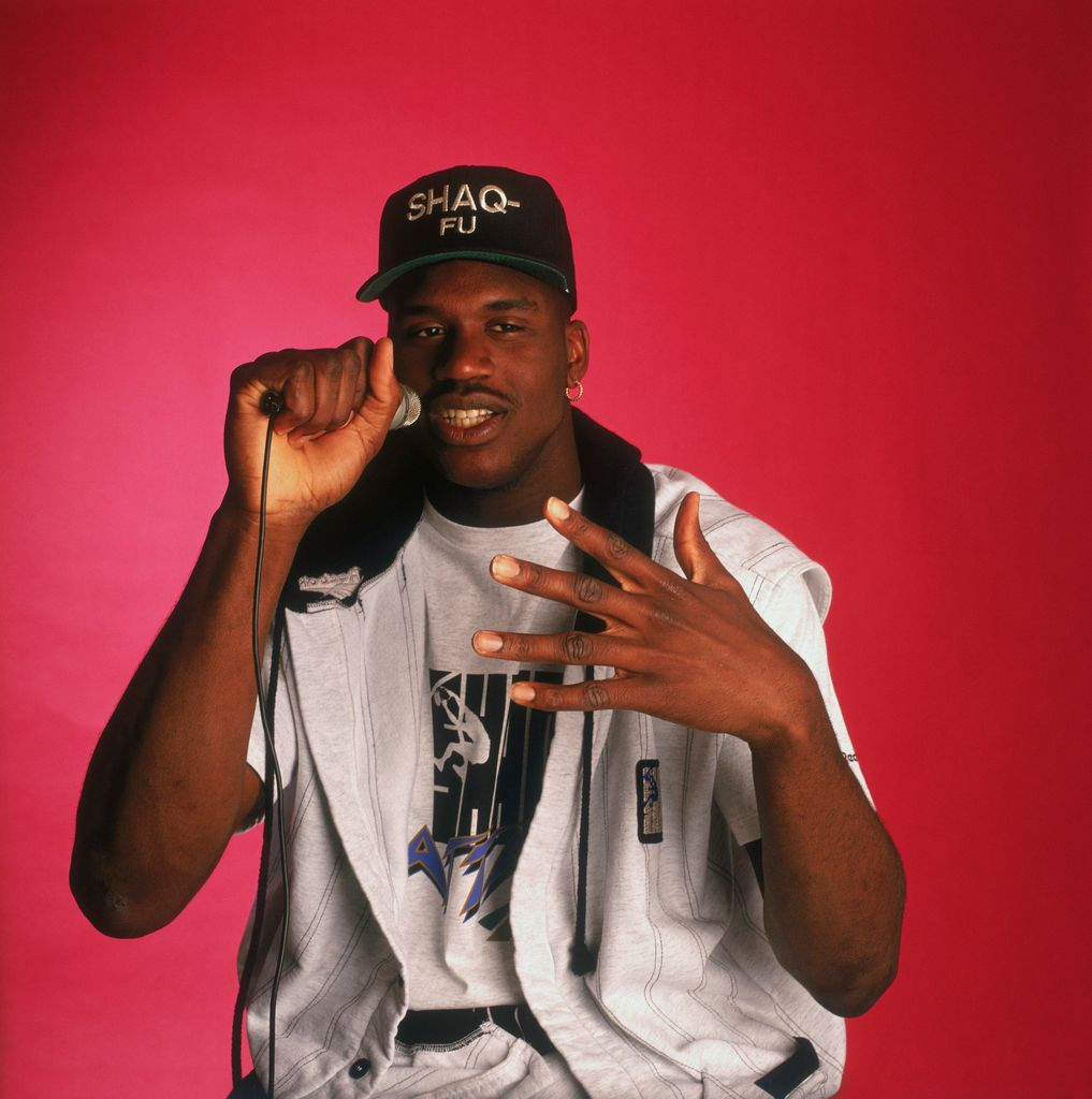 Shaquille O'Neal raps in a studio