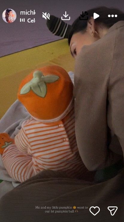 Michelle's daughter Palma looked so cute in her pumpkin outfit