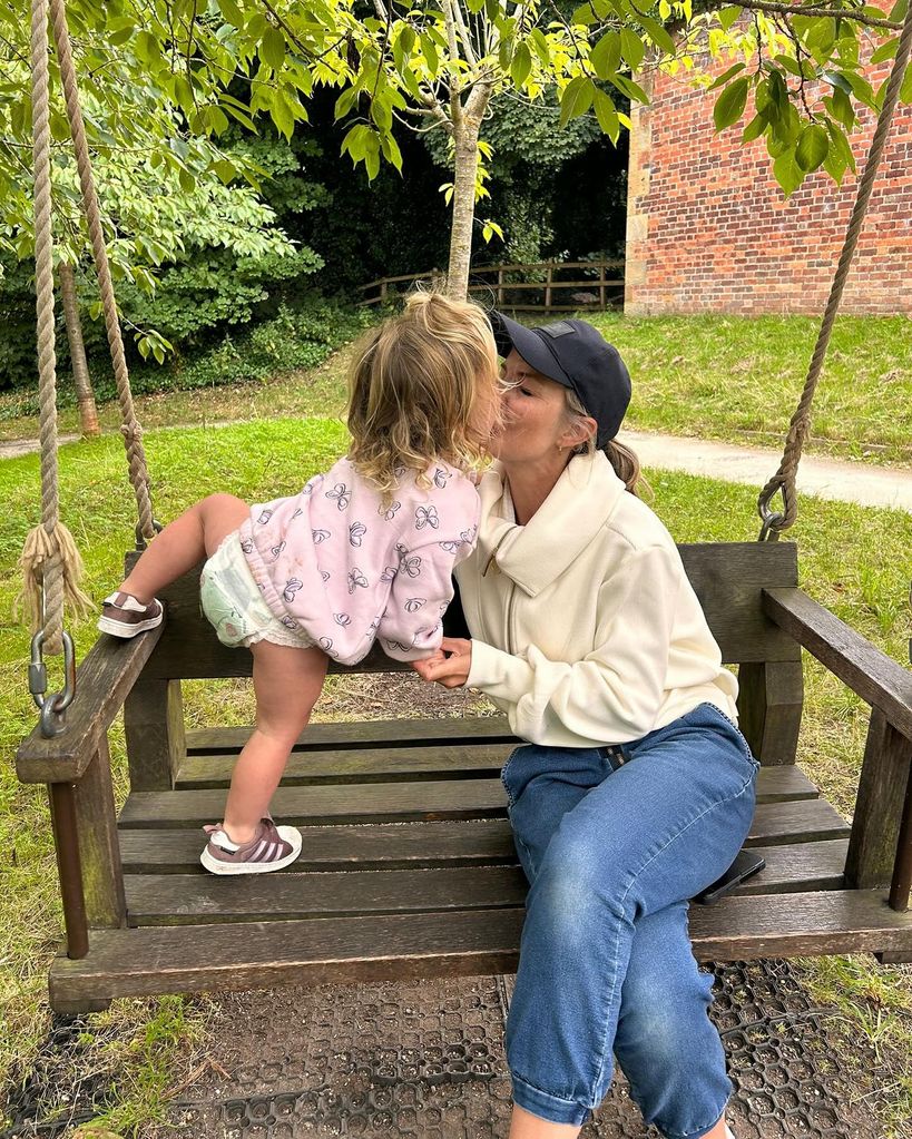 Helen Skelton kissing daughter Elsie