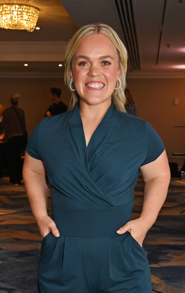 Ellie Simmonds smiling in blue jumpsuit 