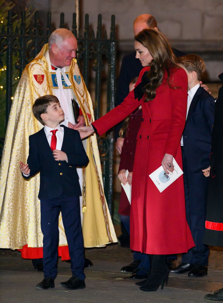 Kate tenderly touched her son's shoulder