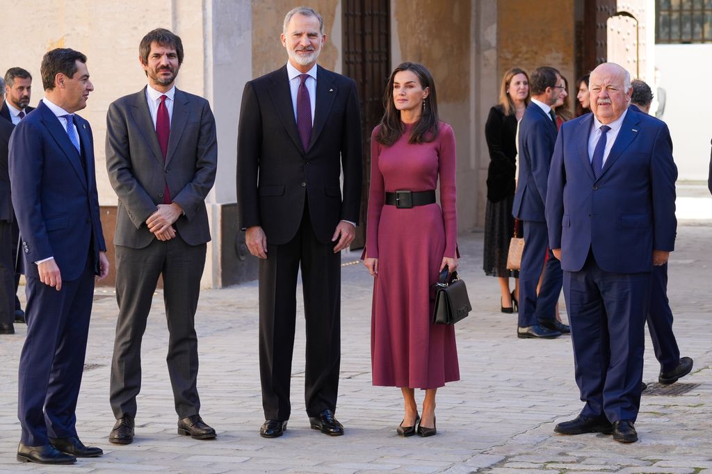 Queen Letizia stunned in a chic burgundy dress